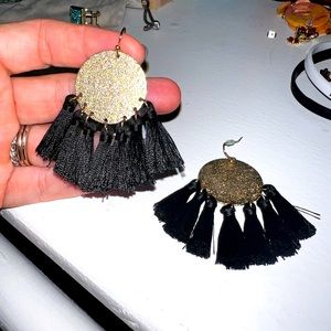 Gold earrings with black fringe